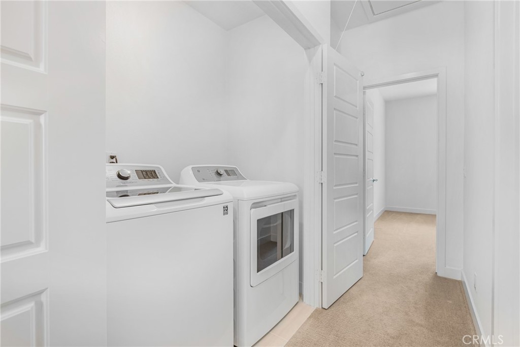 285 Lodestar Tustin, CA 92782 - Photo 31 of 40 a utility room with dryer and washer