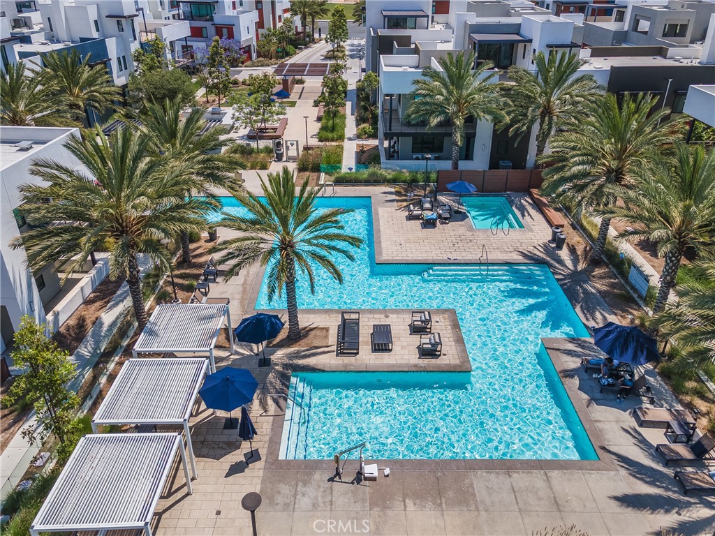285 Lodestar Tustin, CA 92782 - Photo 34 of 40 a front view of multiple houses with yard
