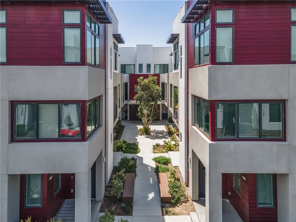 285 Lodestar Tustin, CA 92782 - Photo 6 of 40 a view of a brick building next to a building