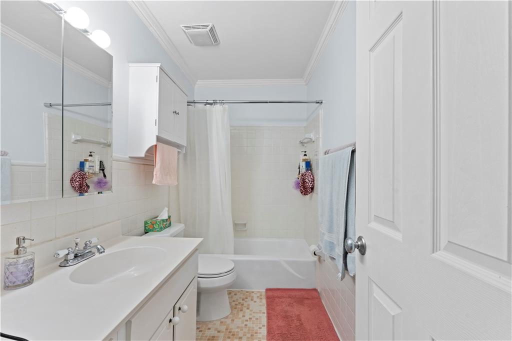 5400 Roswell Road, Unit L6 Sandy Springs, GA 30342 - Photo 12 of 19 a bathroom with a sink toilet and shower