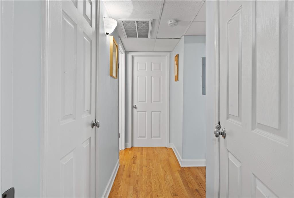 5400 Roswell Road, Unit L6 Sandy Springs, GA 30342 - Photo 16 of 19 a view of a bathroom with a tub and shower