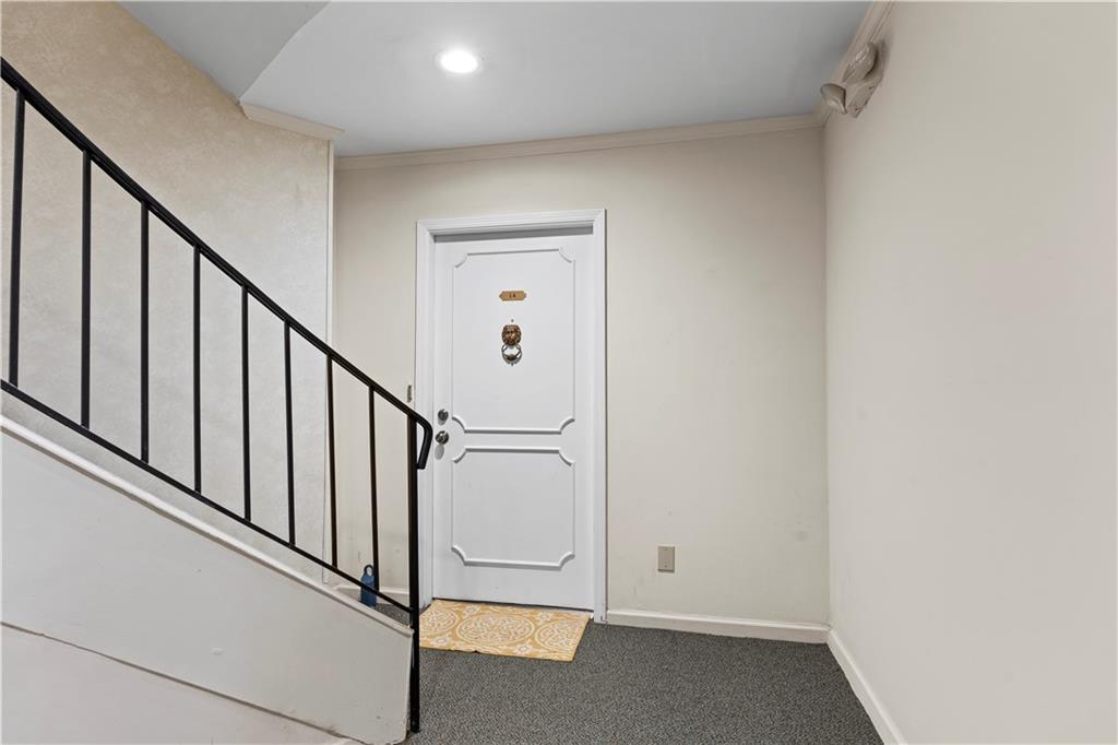 5400 Roswell Road, Unit L6 Sandy Springs, GA 30342 - Photo 3 of 19 a view of a hallway with staircase