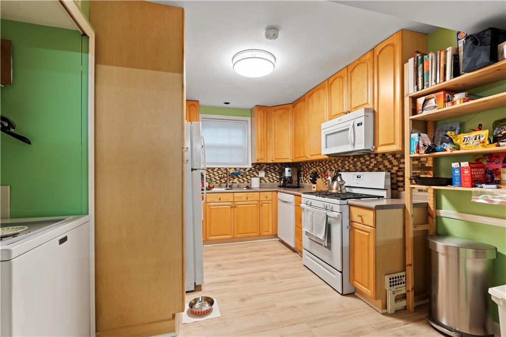 5400 Roswell Road, Unit L6 Sandy Springs, GA 30342 - Photo 9 of 19 a kitchen with stainless steel appliances a stove and a refrigerator