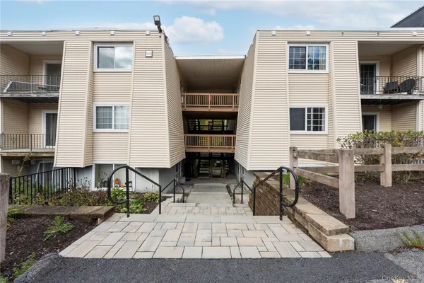a view of house with outdoor space