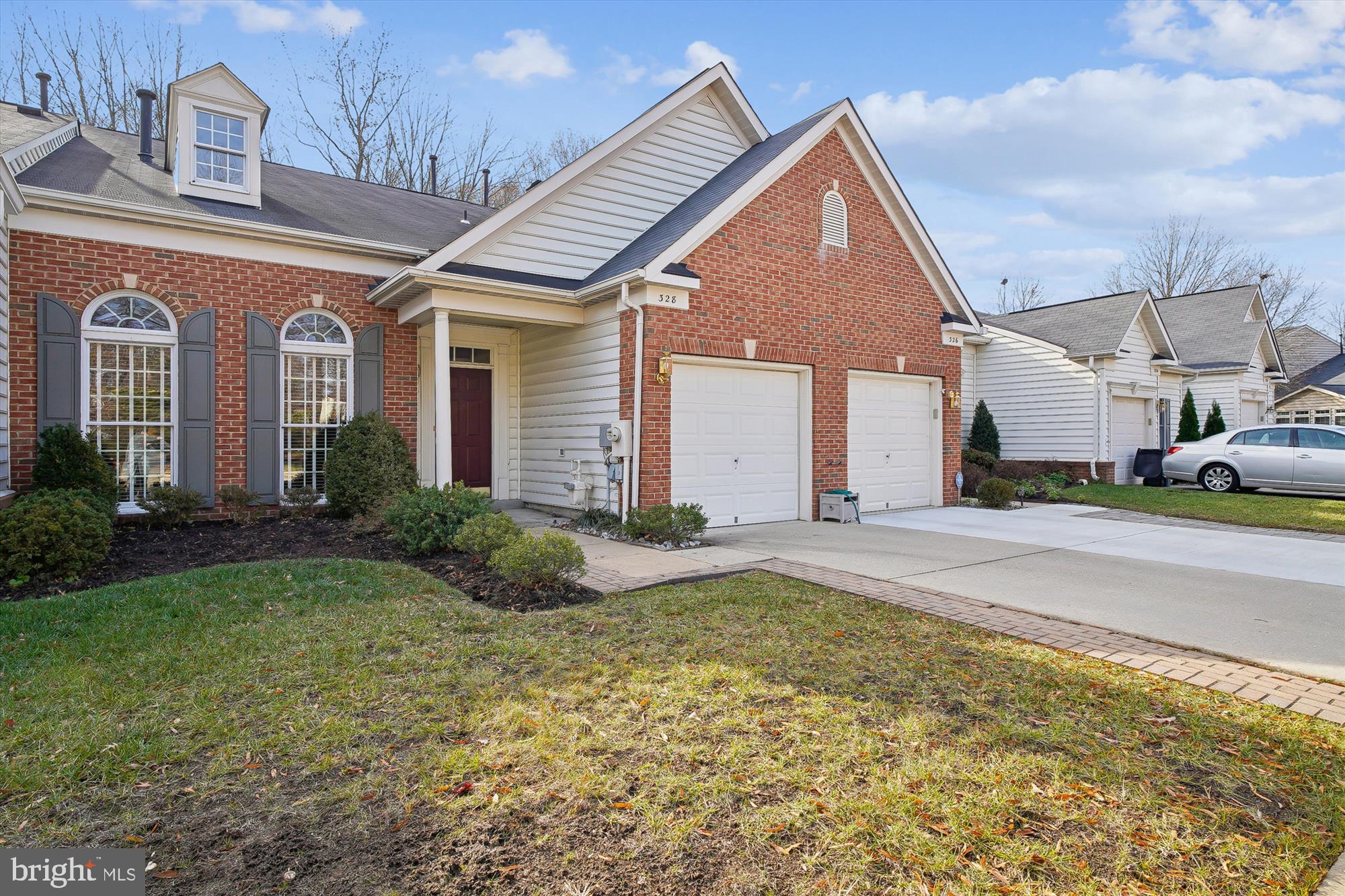 328 Colony Point Place Edgewater, MD 21037 - Photo 2 of 89 a front view of a house with garden