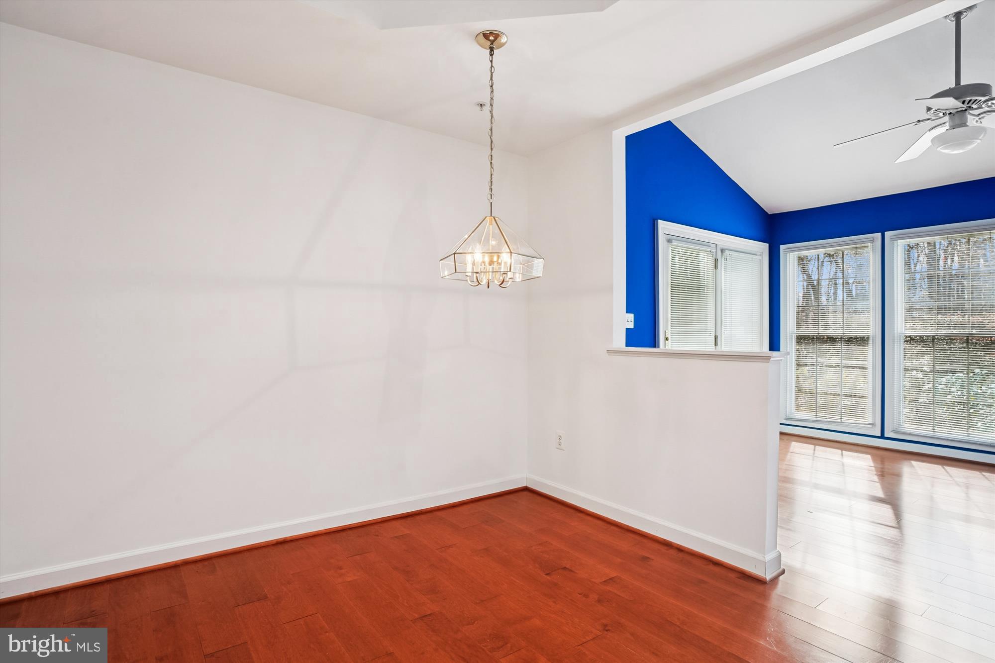 328 Colony Point Place Edgewater, MD 21037 - Photo 24 of 89 a view of an empty room with wooden floor and a window
