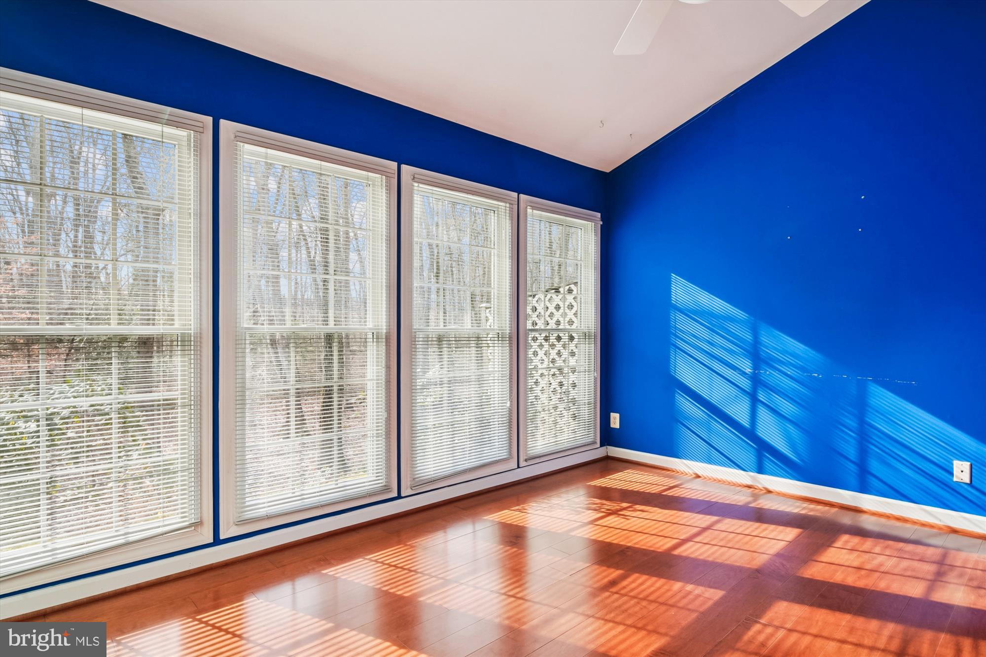 328 Colony Point Place Edgewater, MD 21037 - Photo 30 of 89 a view of empty room with wooden floor and fan