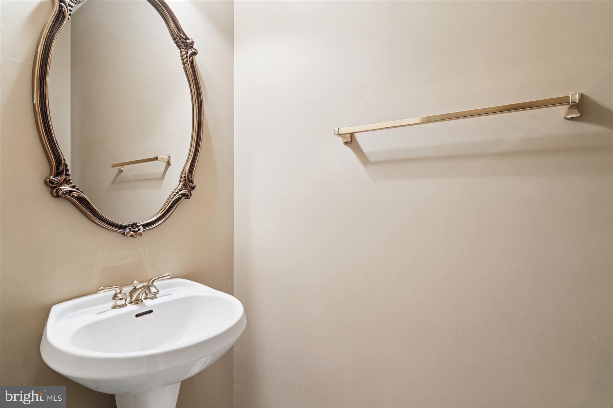328 Colony Point Place Edgewater, MD 21037 - Photo 31 of 89 a bathroom with a sink and a mirror