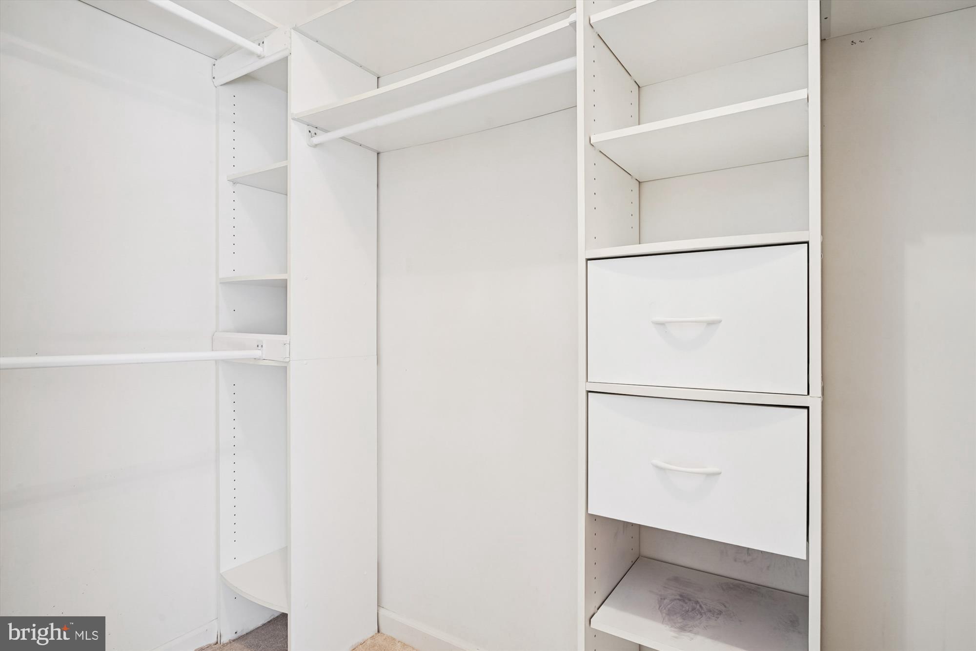 328 Colony Point Place Edgewater, MD 21037 - Photo 37 of 89 a view of walk in closet with empty racks