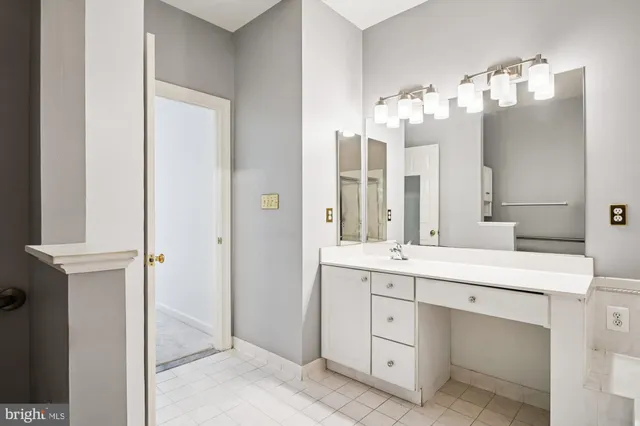 a front view of a house with a large window