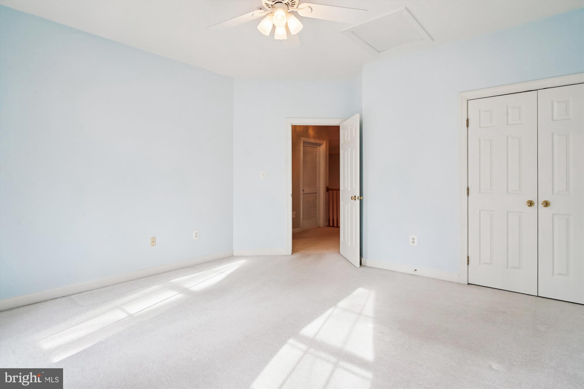 328 Colony Point Place Edgewater, MD 21037 - Photo 47 of 89 an empty room with a ceiling fan and a window