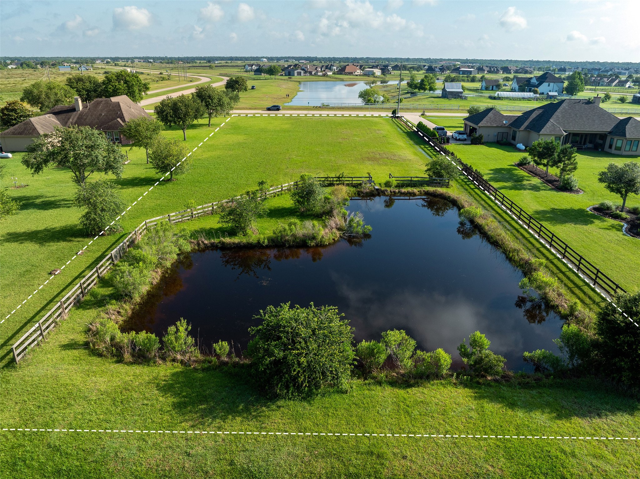 7706 Pebble Hill Lane Rosharon, TX 77583 - Photo 8 of 16 an aerial view of a houses with a yard