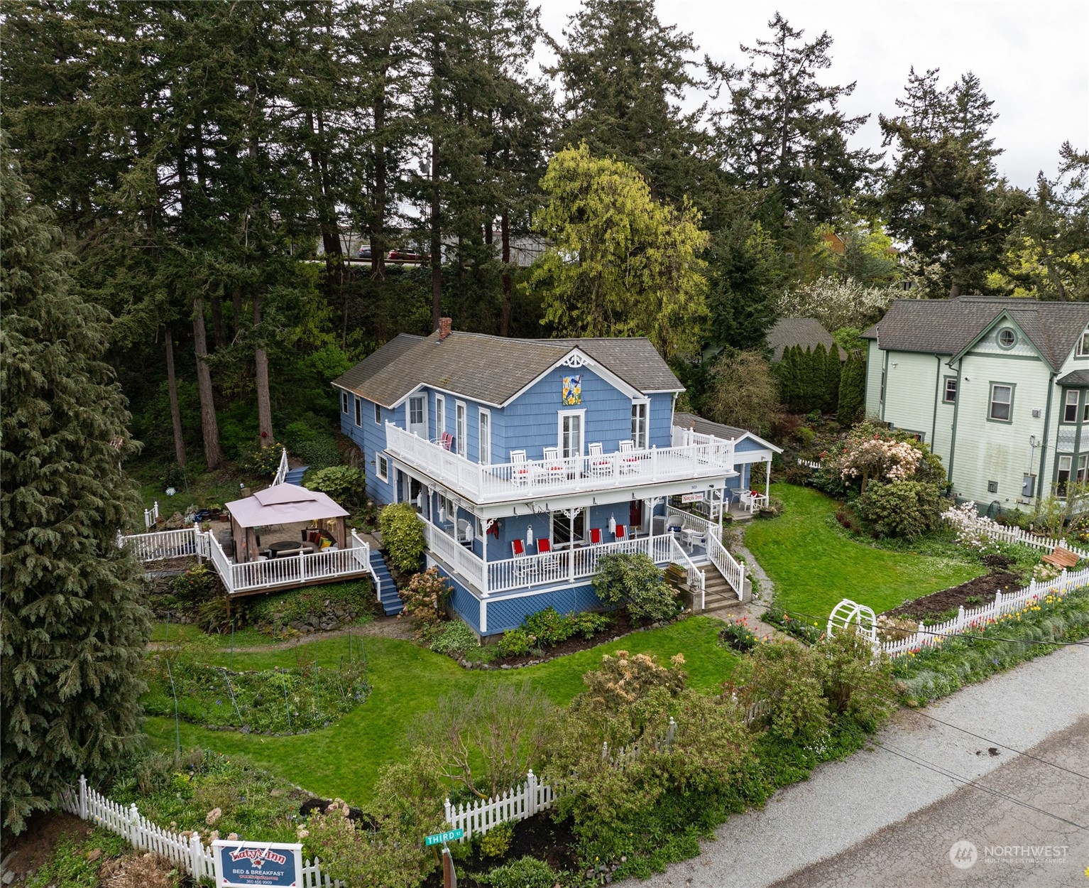 a aerial view of a house with a garden