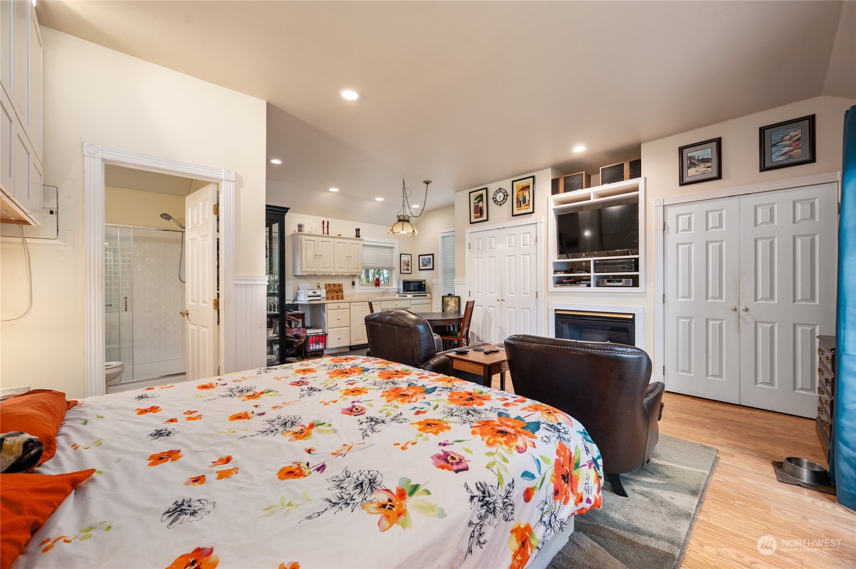 503 South 3rd Street La Conner, WA 98257 - Photo 19 of 39 a bedroom with a bed and wooden floor