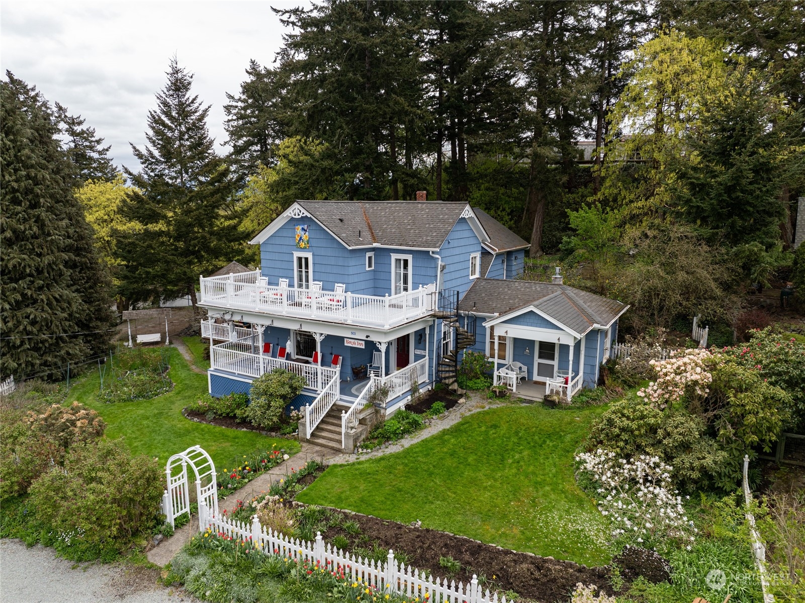 503 South 3rd Street La Conner, WA 98257 - Photo 2 of 39 a aerial view of a house with a big yard and large trees