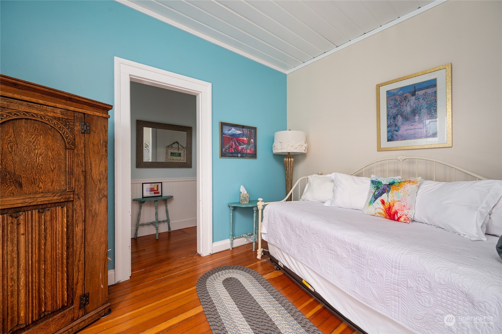 503 South 3rd Street La Conner, WA 98257 - Photo 25 of 39 a bedroom with a bed and a bookshelf