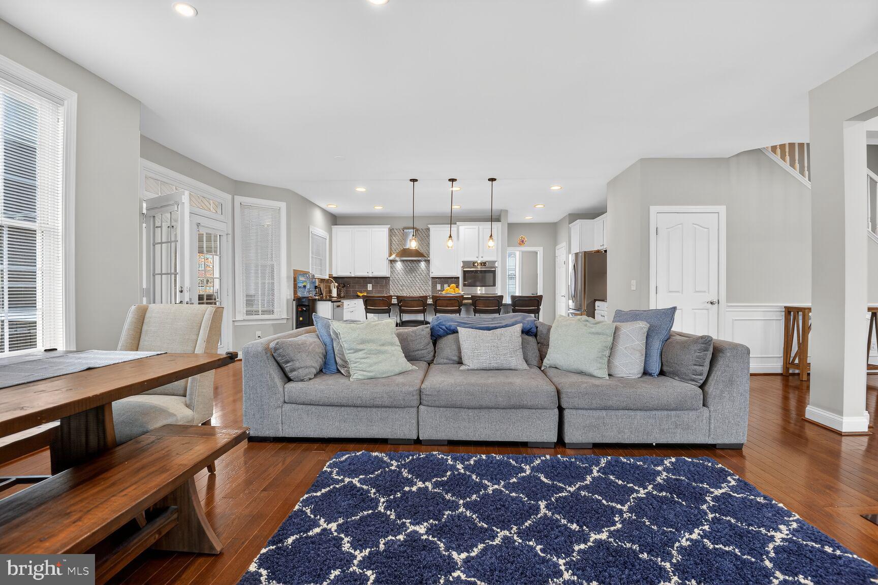 8808 Talbert Road Lorton, VA 22079 - Photo 16 of 52 a living room with furniture and a rug