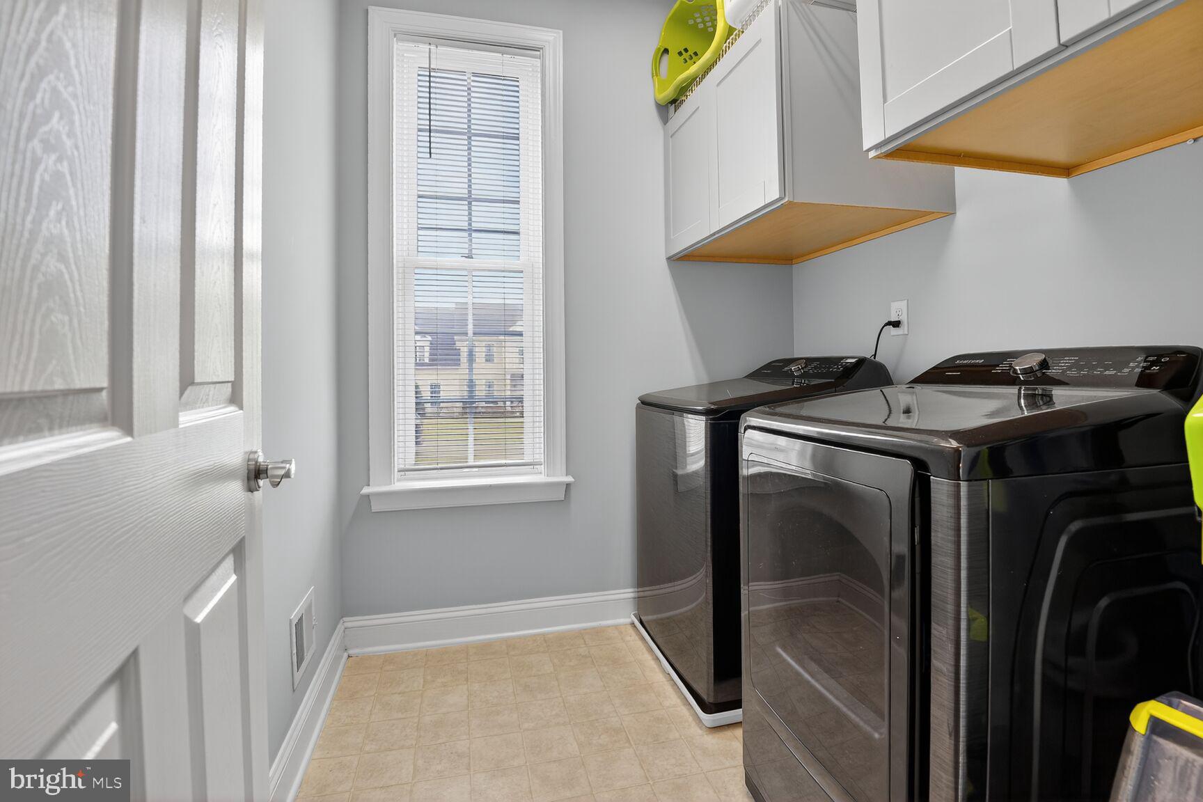 8808 Talbert Road Lorton, VA 22079 - Photo 19 of 52 a utility room with dryer and washer