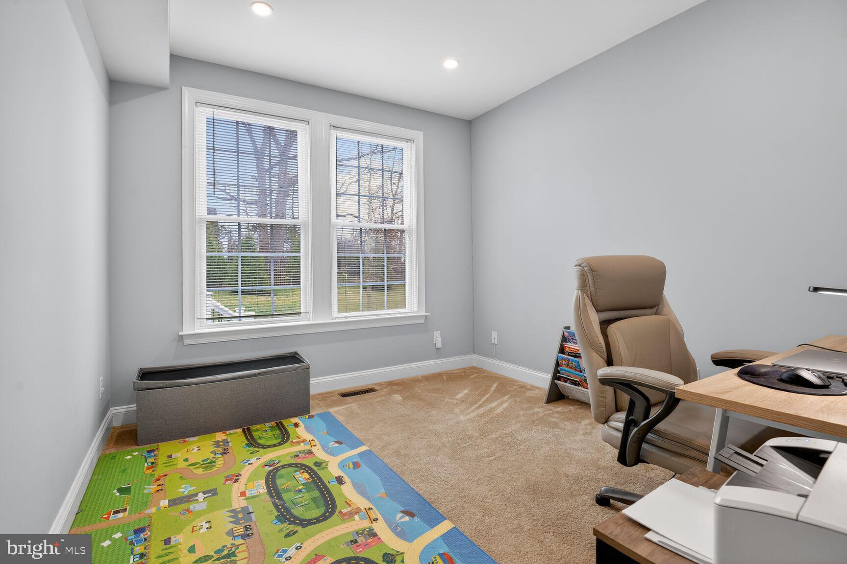 8808 Talbert Road Lorton, VA 22079 - Photo 20 of 52 a bedroom with a bed and a window