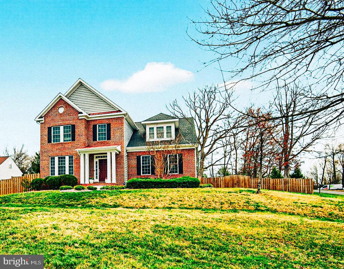 8808 Talbert Road Lorton, VA 22079 - Photo 2 of 52 a front view of houses with yard