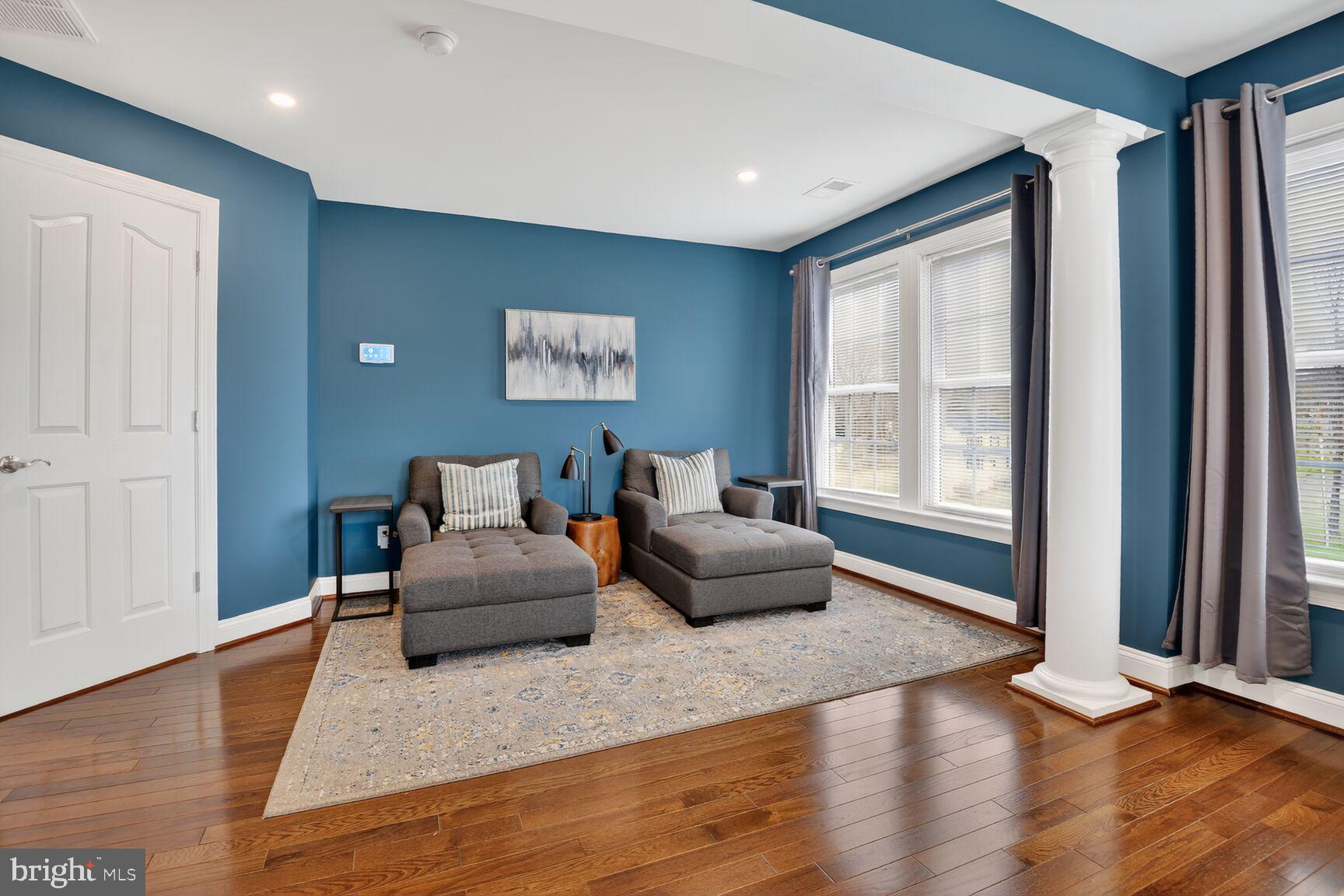 8808 Talbert Road Lorton, VA 22079 - Photo 27 of 52 a living room with furniture and a large window
