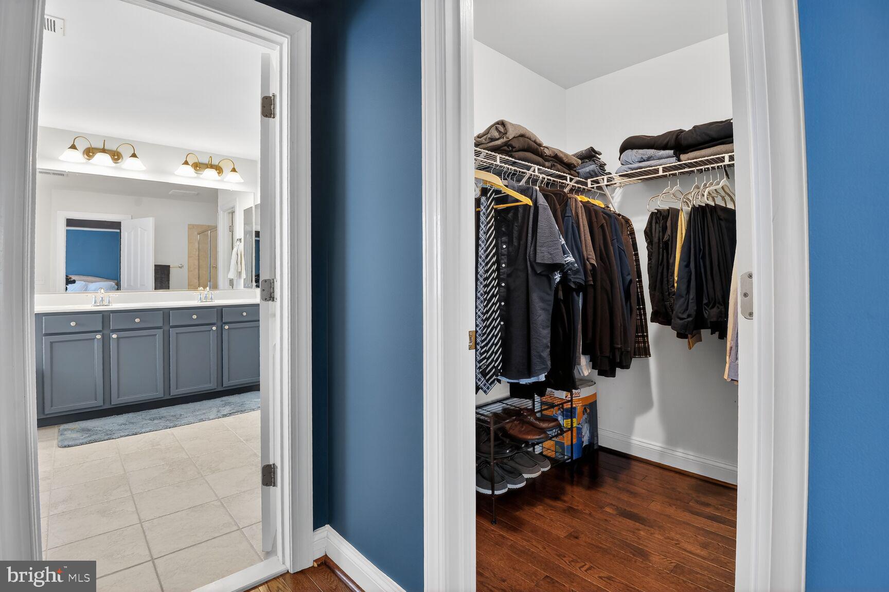 8808 Talbert Road Lorton, VA 22079 - Photo 28 of 52 a view of walk in closet with clothes and shoes