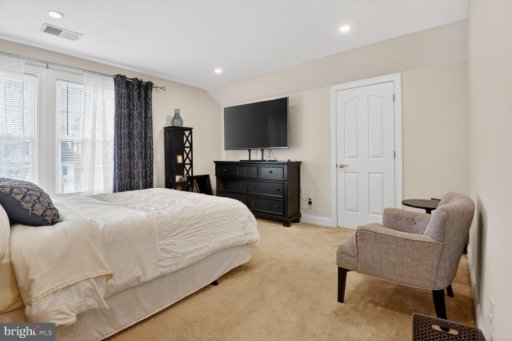 8808 Talbert Road Lorton, VA 22079 - Photo 32 of 52 a bedroom with a bed and a chair