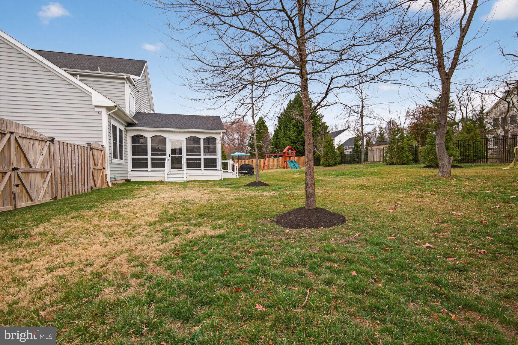 8808 Talbert Road Lorton, VA 22079 - Photo 46 of 52 a backyard of a house with barbeque oven