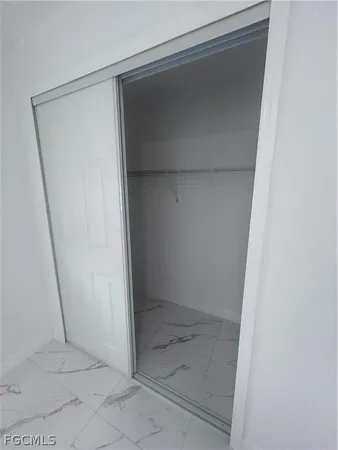 a bathroom with a glass door