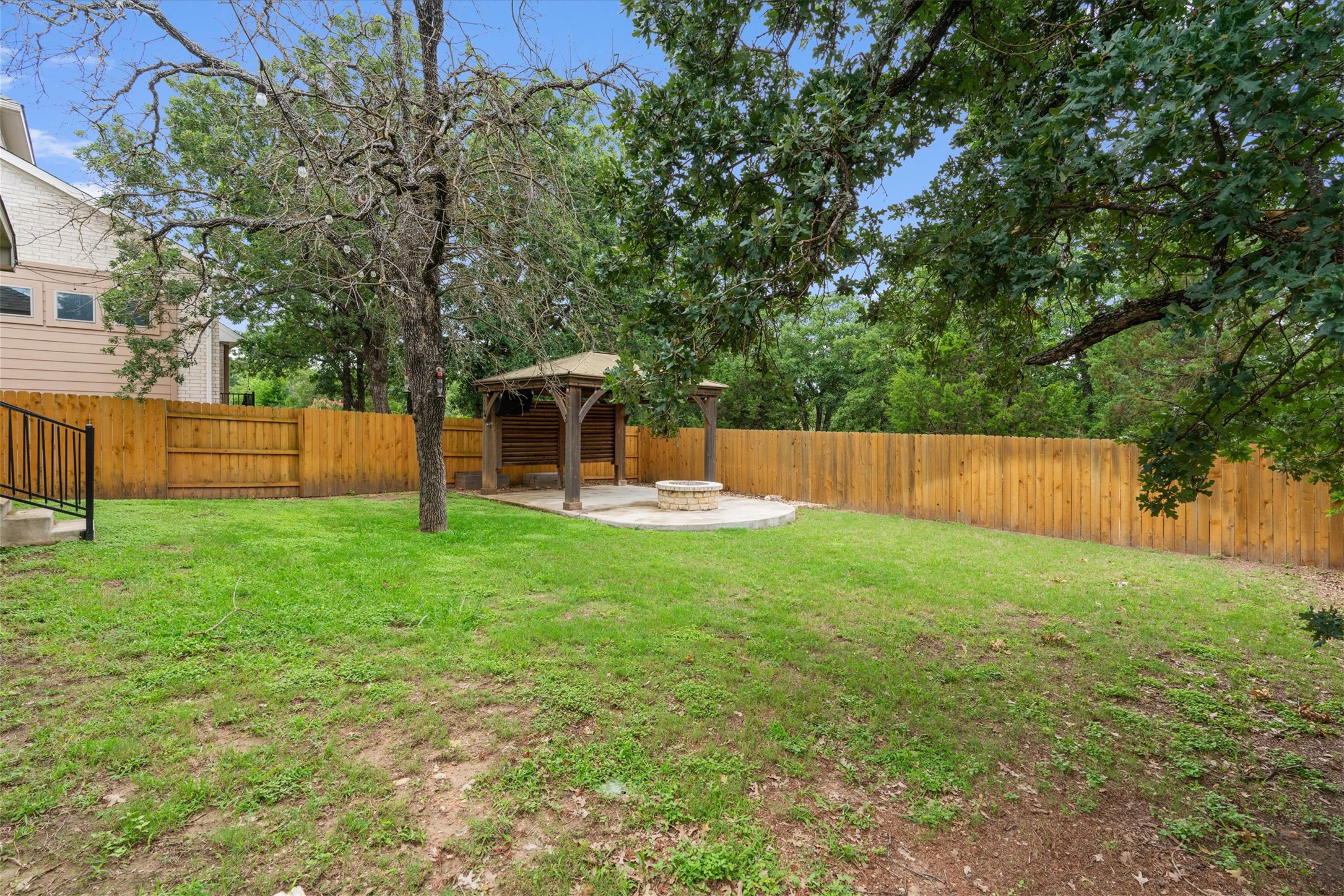 941 Del Raphael Drive Leander, TX 78641 - Photo 23 of 31 Because the yard backs up to a heavily wooded property, you get a rare sense of total privacy