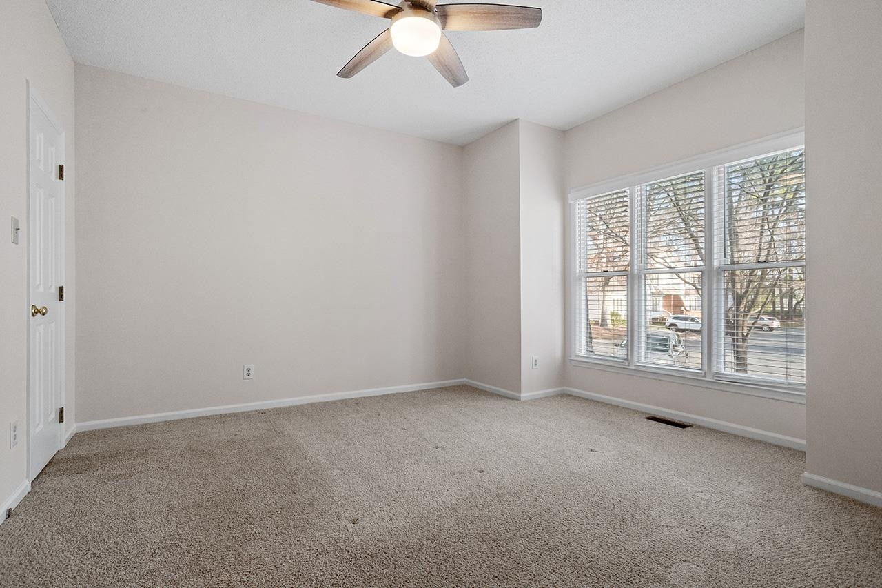 3715 Carnegie Lane Raleigh, NC 27612 - Photo 19 of 37 Could serve as a master bedroom as it has direct access to a full bath and walk in closet First Floor Bedroom