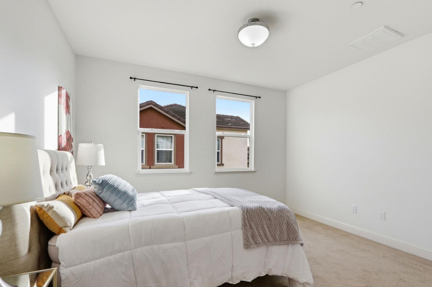 1550 Bleecker Street Milpitas, CA 95035 - Photo 15 of 35 a bedroom with a bed and a window