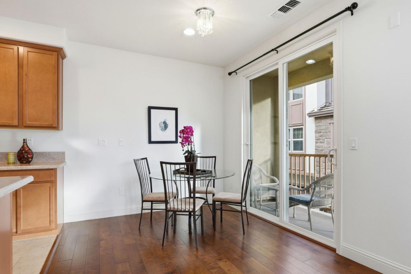 1550 Bleecker Street Milpitas, CA 95035 - Photo 9 of 35 a view of a dining room with furniture and wooden floor