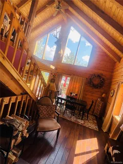 a view of furniture in wooden floor