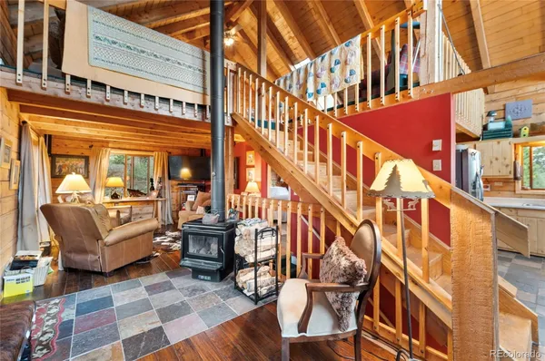 a view of a building with furniture and staircase