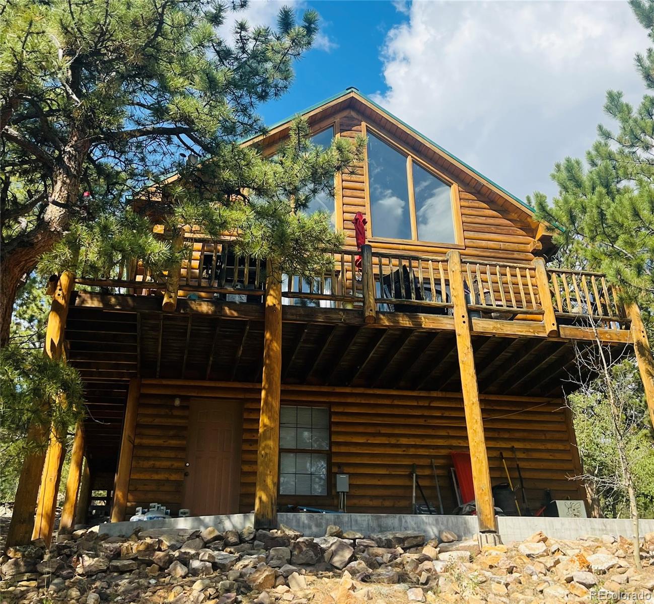2578 Redhill Road Fairplay, CO 80440 - Photo 2 of 48 a front view of a house with a yard
