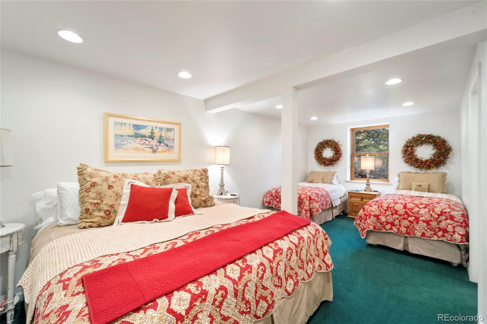 2578 Redhill Road Fairplay, CO 80440 - Photo 28 of 48 a bedroom with two beds and a potted plant