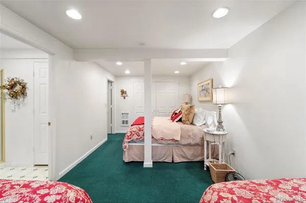 a bathroom with a toilet sink and shower
