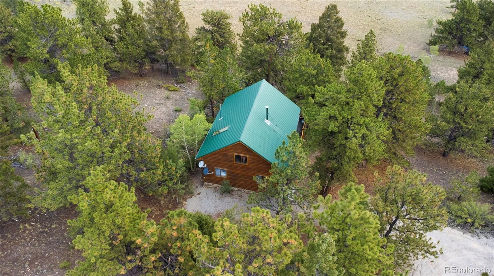 2578 Redhill Road Fairplay, CO 80440 - Photo 43 of 48 an aerial view of a house with a yard and tree s