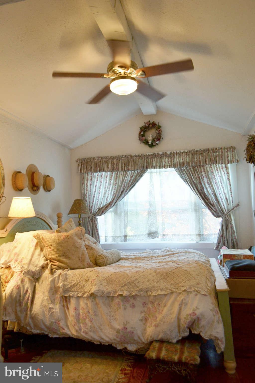 747 Anneslie Road Baltimore, MD 21212 - Photo 24 of 29 Vaulted Ceiling with Beam in Master Bedroom