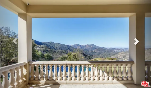 a view of a street from a balcony