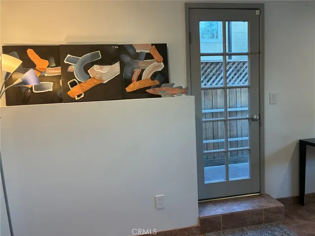 wooden floor with some white walls