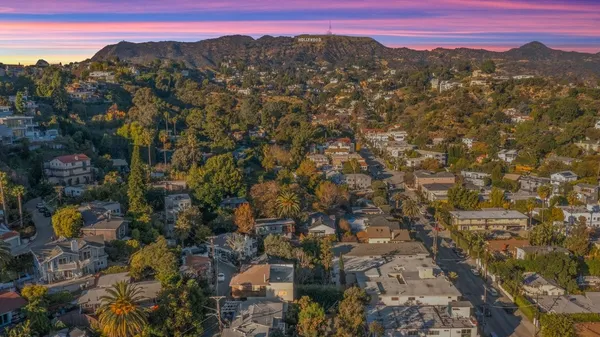 a view of a city with mountain