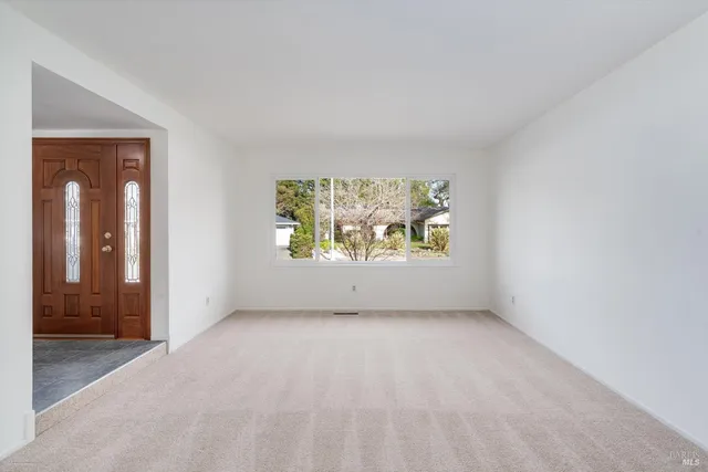 an empty room with windows