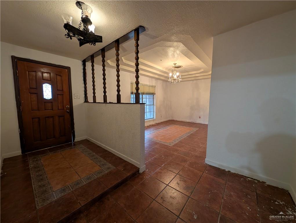 2012 Spring Glenn Avenue Mission, TX 78572 - Photo 2 of 20 wooden floor in an empty room with a window