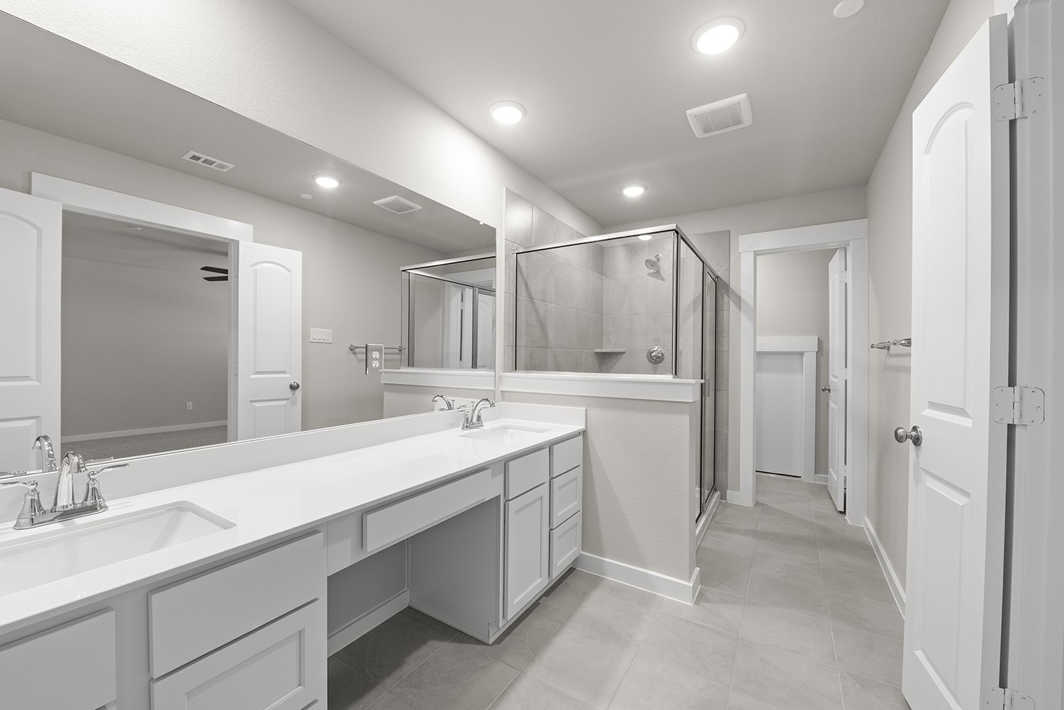 The elegant finishes, from the dazzling floors to the chic light fixtures, reflect a careful attention to detail that feels both luxurious and comforting. 