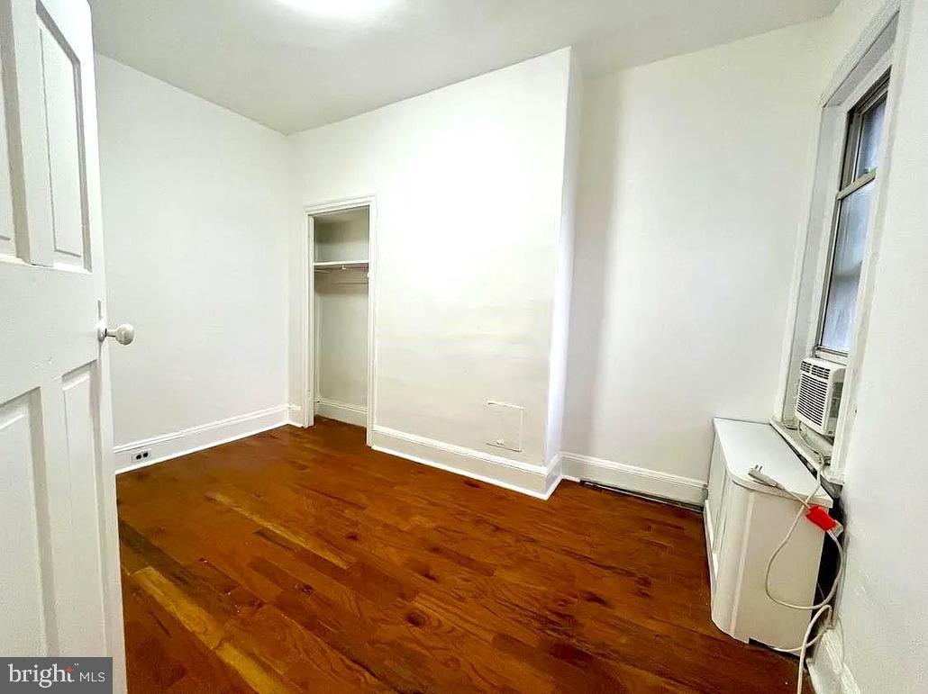 2127 Tasker Street, Unit 2 Philadelphia, PA 19145 - Photo 4 of 5 a view of empty room with wooden floor