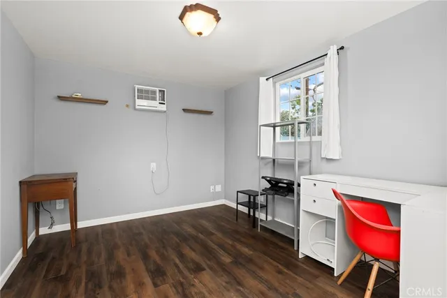 a room with furniture and a window