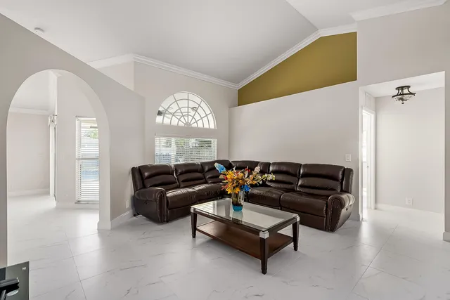 a view of a living room and a kitchen