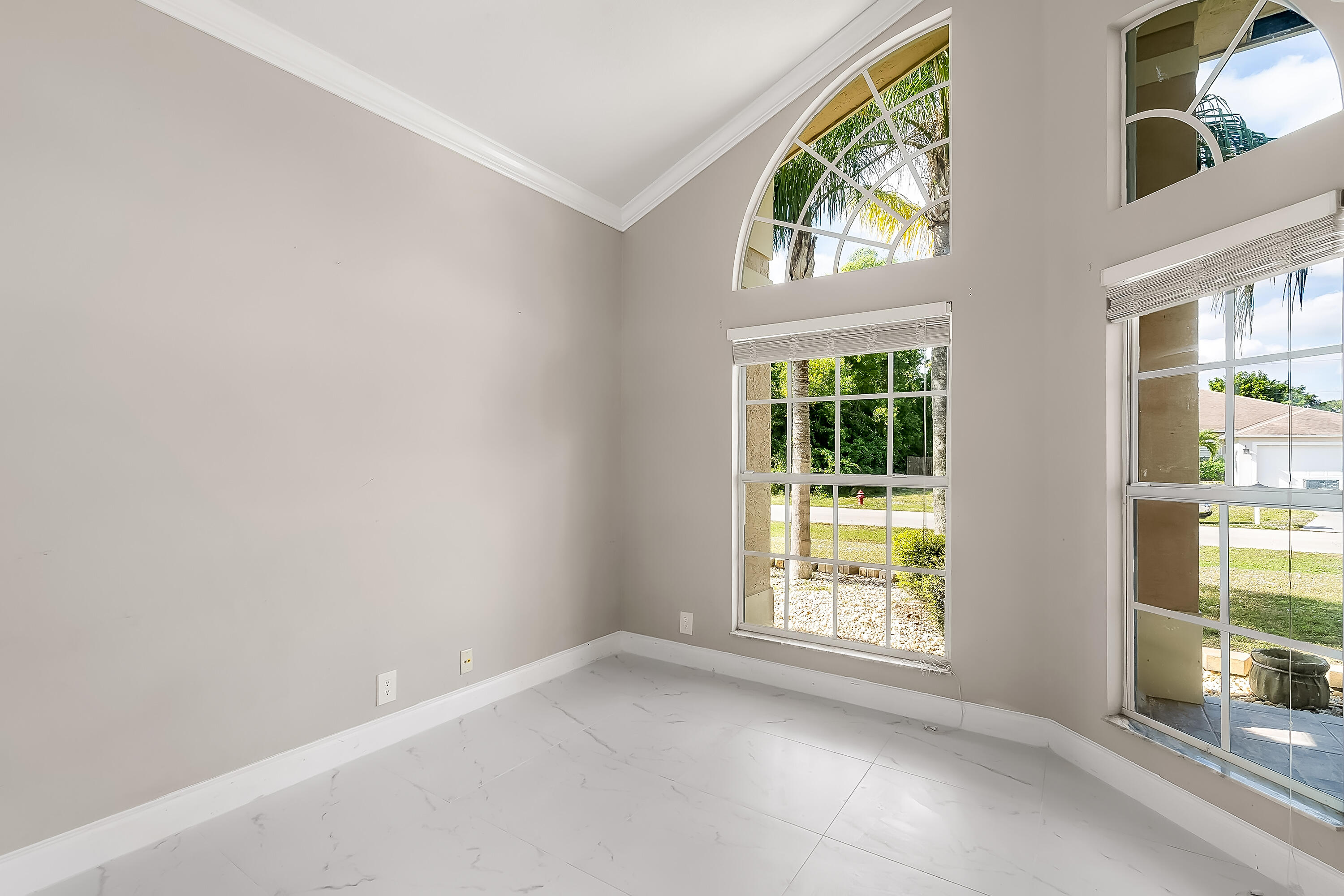 2962 Southwest Coastal Terrace Port St. Lucie, FL 34953 - Photo 21 of 59 a view of an empty room with a window